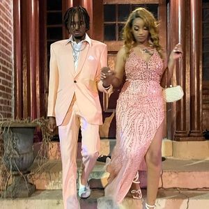 I’m selling this pink dress from prom . Only worn once and it is fitted .